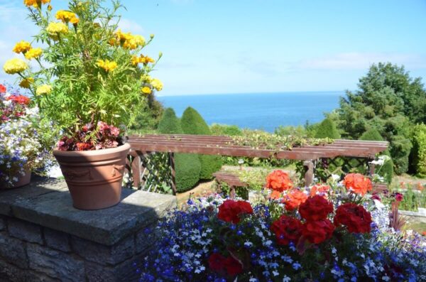 Views Across the Gardens to the Sea at Luccombe Hall Hotel, Isle of Wight