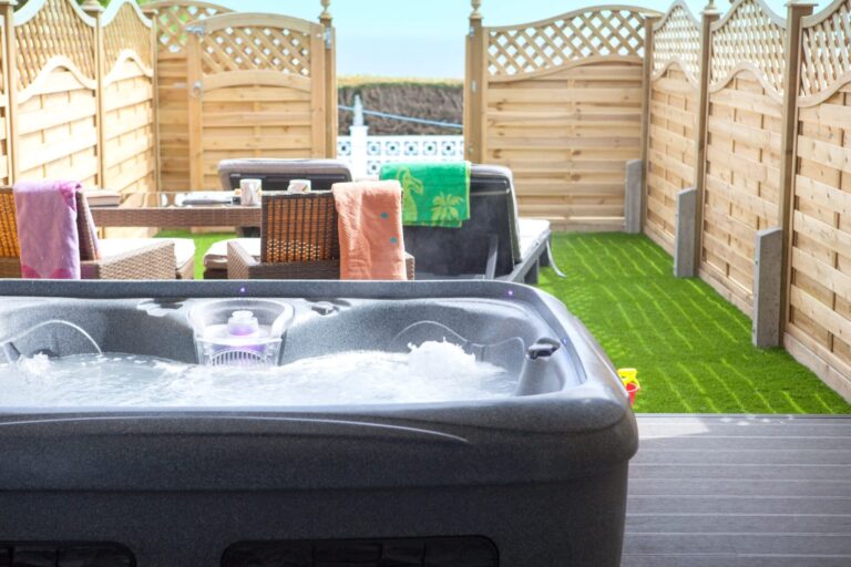 Rooms - The private hot tub and garden of a Superior Garden Room