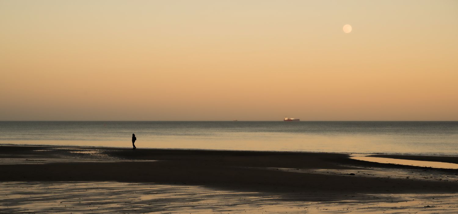 The beach below at sunset