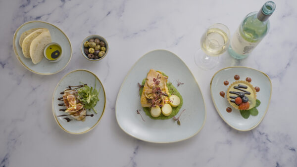 Evening dinner dishes and a glass of wine