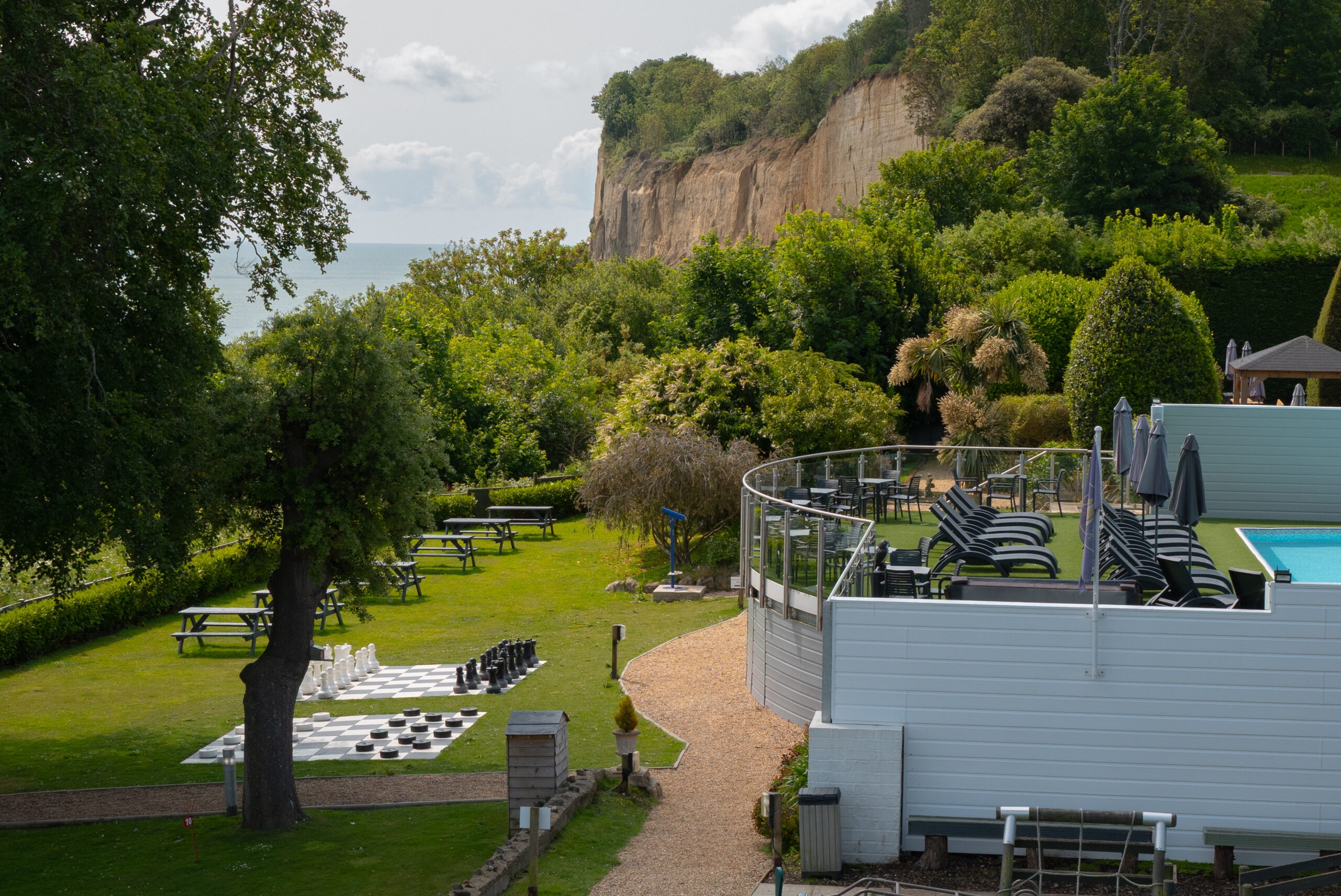 The gardens, cliff and sea from Luccombe Hall