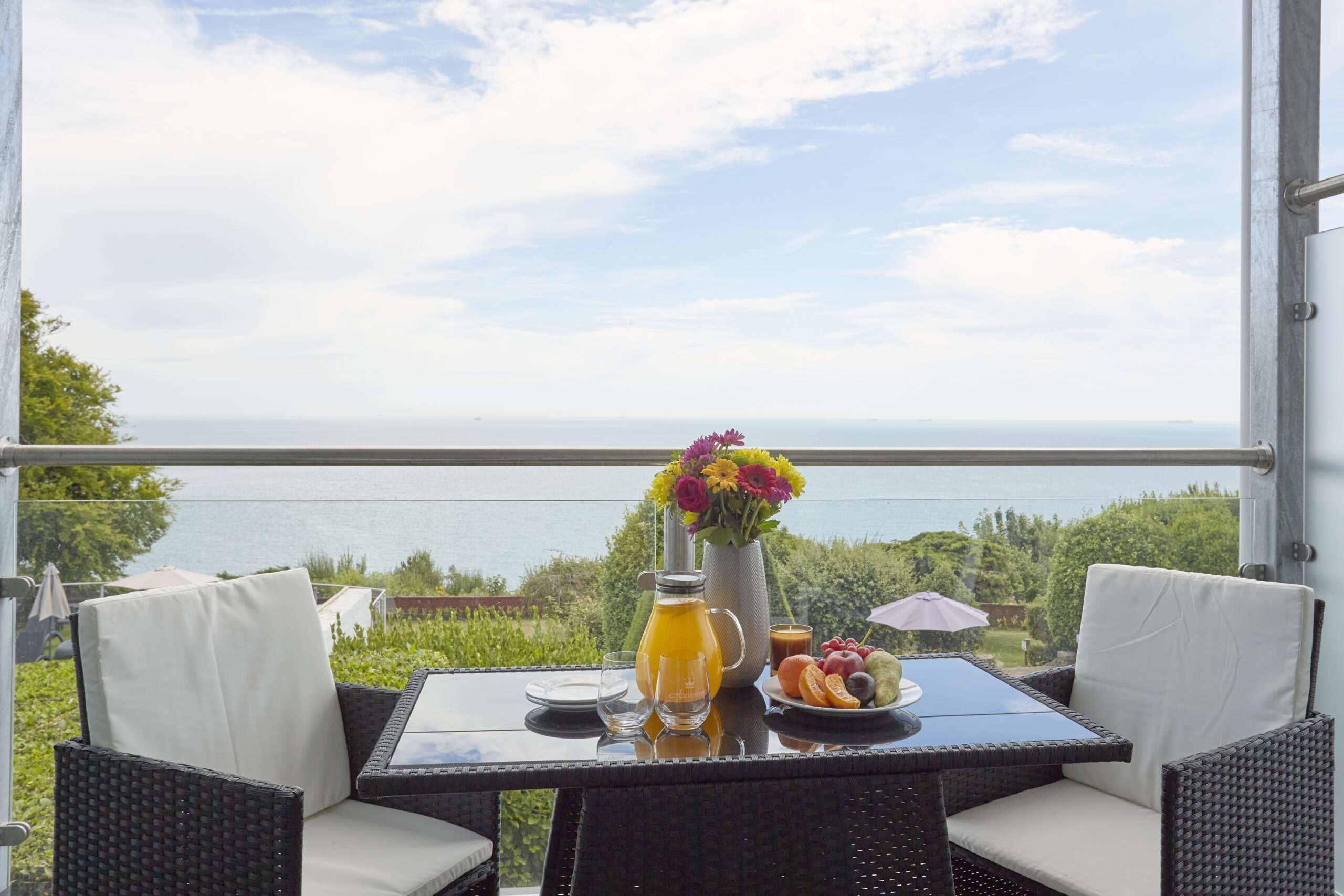 Breakfast on a sea-facing balcony